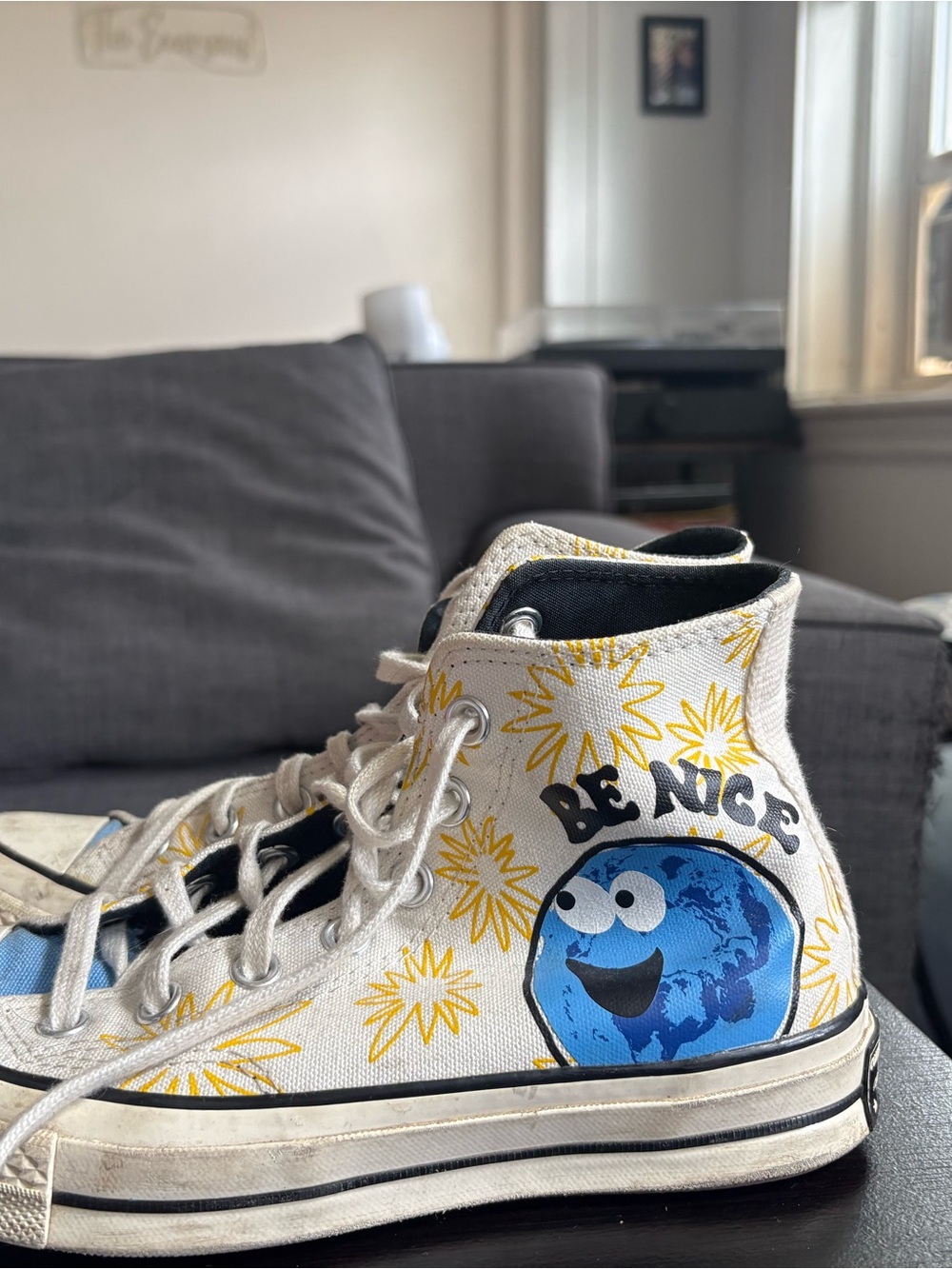White High-Top Sneaker with Blue Cartoon Earth & Yellow Sunbursts